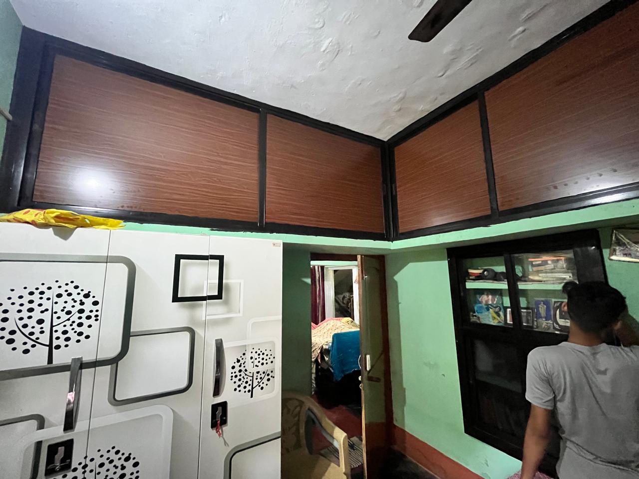 Overhead Sliding Storage with Wooden Panels